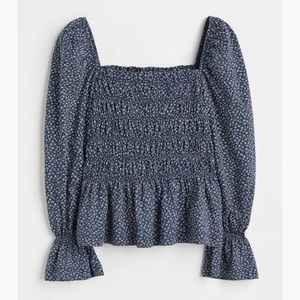 Excellent condition Top in cotton jersey with a smocked bodice and peplum